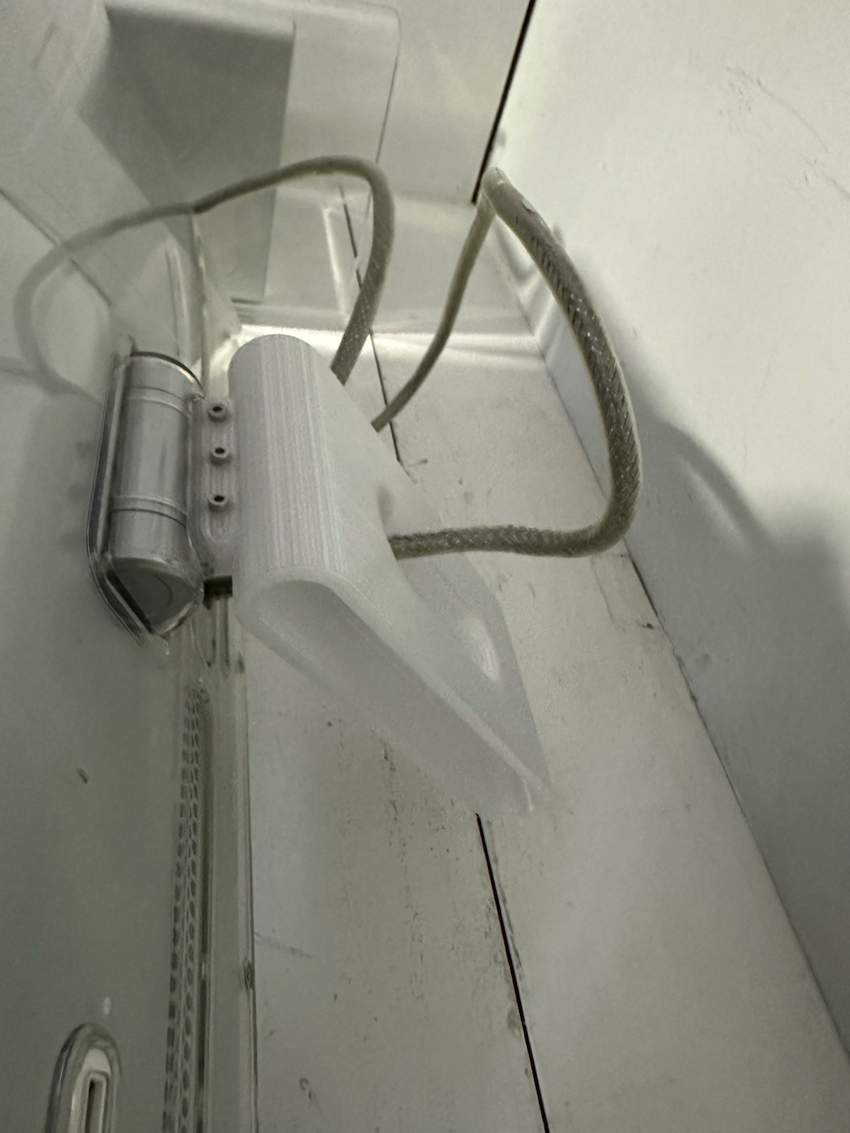Apple Cinema Display standing after 3D printed leg repair